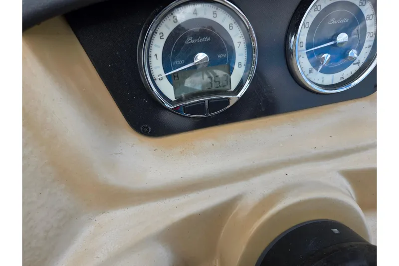 Slide: The Image of Dashboard of a 2021 Barletta C22QC boat showing gauges and controls. - 20