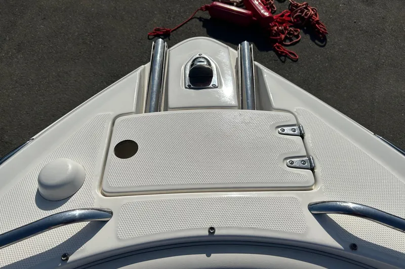 Slide: The Image of Bow of 2007 Chaparral 246 SSi boat with anchor hatch and red rope. - 7