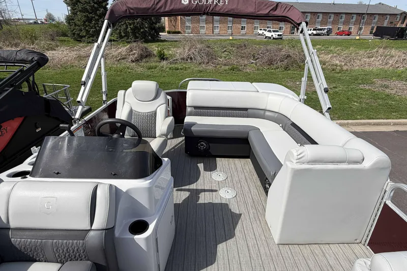 Slide: The Image of 2022 Godfrey Sweetwater 2286 C pontoon boat with spacious seating and modern design. - 12