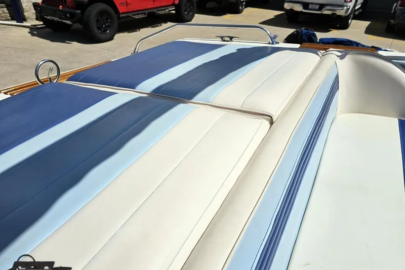 Slide: The Image of 1988 Glastron/Carlson CVX-23 boat interior with blue and white upholstery. - 41