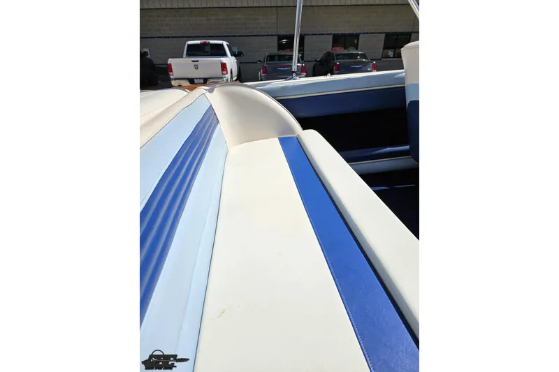 Slide: The Image of 1988 Glastron/Carlson CVX-23 boat interior with blue and white upholstery. - 43