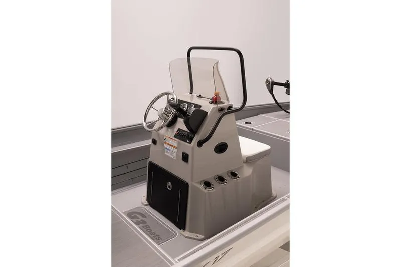 Slide: The Image of Center console of 2026 G3 Bay 17 boat with steering wheel and controls. - 3