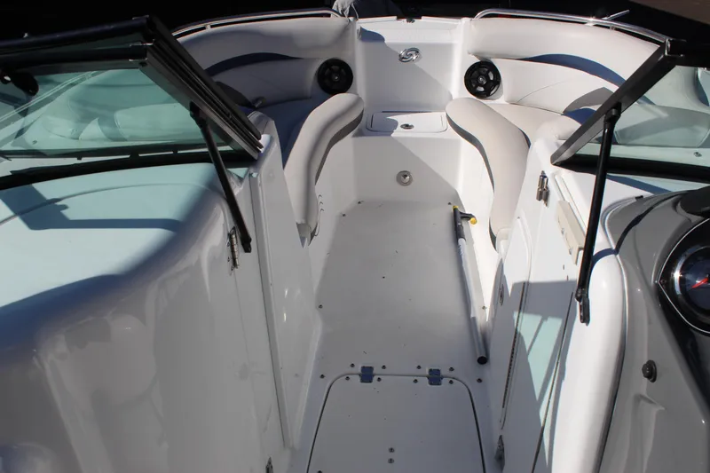Slide: The Image of 2018 Hurricane SunDeck 2200 DC OB boat interior with seating and windshield. - 4