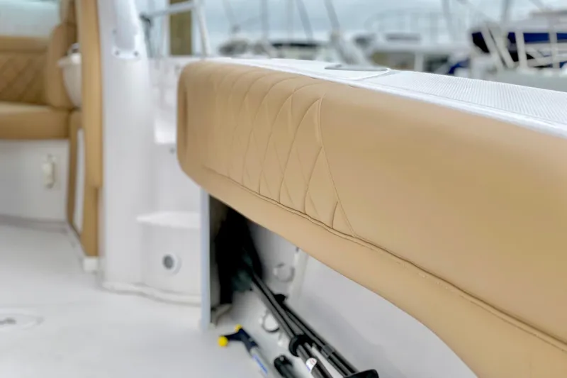 Slide: The Image of Interior view of a 2006 Donzi 38 ZSF boat with tan leather seating. - 22
