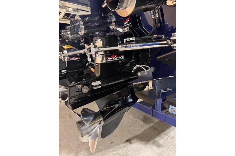 Slide: The Image of Close-up of a 2000 Python Offshore boat engine with MerCruiser components. - 17