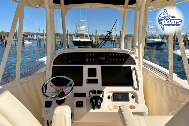 Slide: The Image of Manufacturer Provided Image: 2021 Grady-White Canyon 306 boat interior storage compartments. - 9