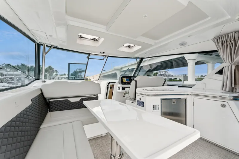 Slide: The Image of Interior of 2025 Aquila 36 Cruiser yacht with modern seating and sleek design. - 20
