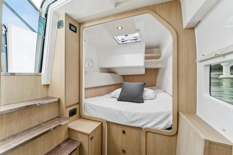 Slide: The Image of Interior cabin of 2025 Aquila 36 Cruiser with cozy bed and modern design. - 39