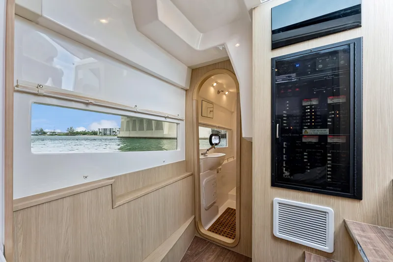 Slide: The Image of Interior of 2025 Aquila 36 Cruiser, featuring modern design and control panel. - 40