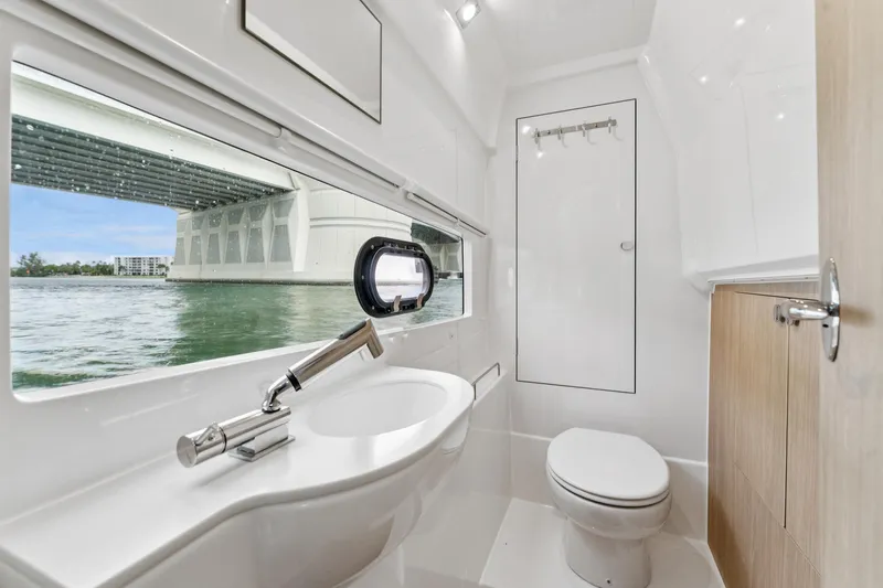 Slide: The Image of Modern bathroom interior on 2025 Aquila 36 Cruiser yacht, featuring sleek design and waterfront view. - 43