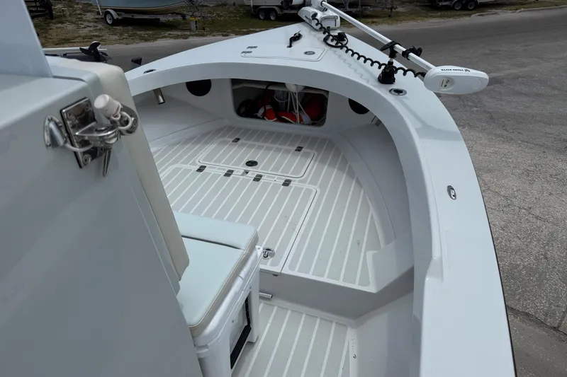 Slide: The Image of 2023 Exuma Exuma 22 boat interior with seating and storage compartments. - 6