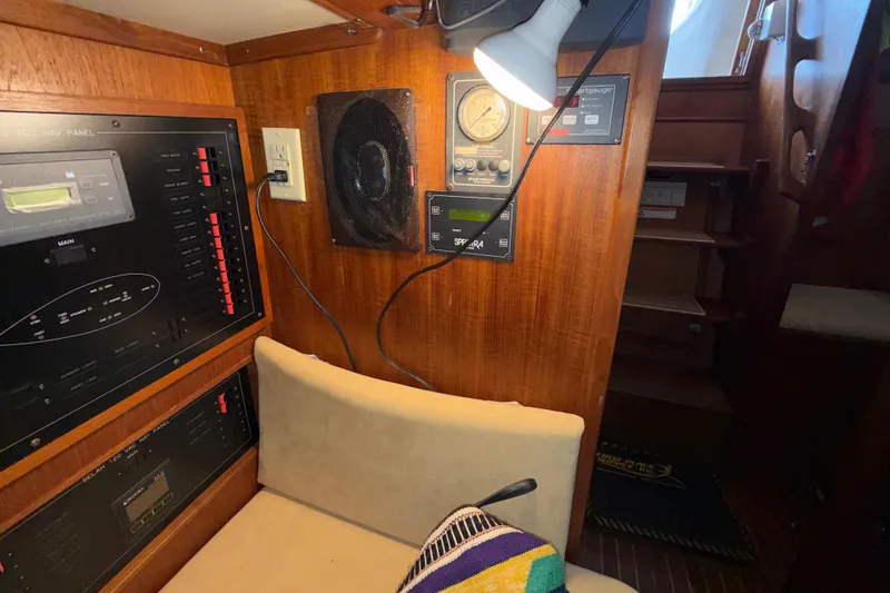 Slide: The Image of 1983 Valiant Cutter interior with navigation panel and cozy seating area. - 9