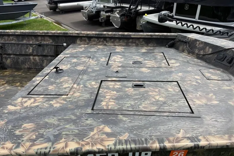 Slide: The Image of 2021 Crestliner 1760 Retriever SC boat with camouflage deck design. - 10