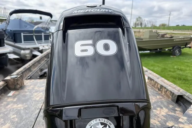 Slide: The Image of Mercury 60 horsepower outboard motor on 2021 Crestliner 1760 Retriever SC boat. - 15
