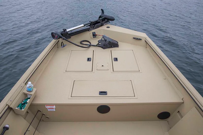 Slide: The Image of Manufacturer Provided Image: 2021 Crestliner 1760 Retriever SC boat deck with storage compartments and trolling motor. - 19
