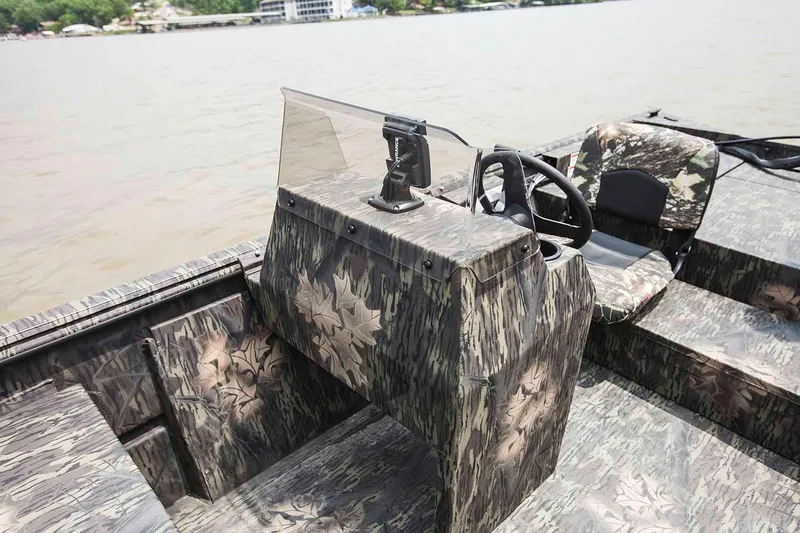 Slide: The Image of Manufacturer Provided Image: 2021 Crestliner 1760 Retriever SC boat with camouflage design on a lake. - 21