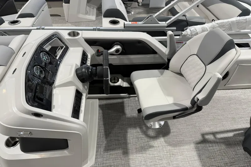 Slide: The Image of Cockpit of 2026 Avalon 1985 25 LSZ CRB boat with modern steering and seating. - 4