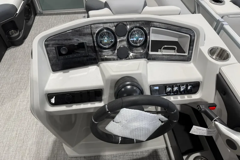 Slide: The Image of Steering console of 2026 Avalon 1985 25 LSZ CRB boat with modern controls and gauges. - 5