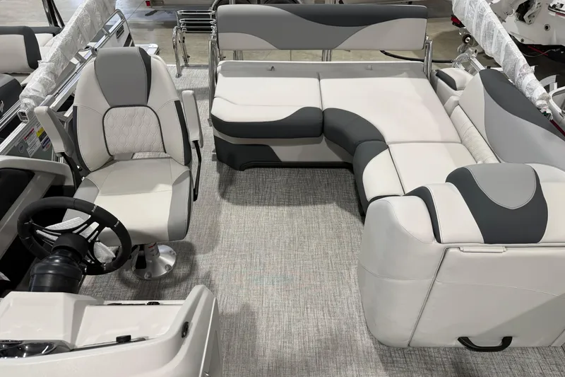 Slide: The Image of Interior of 2026 Avalon 1985 25 LSZ CRB boat with modern seating and steering wheel. - 6