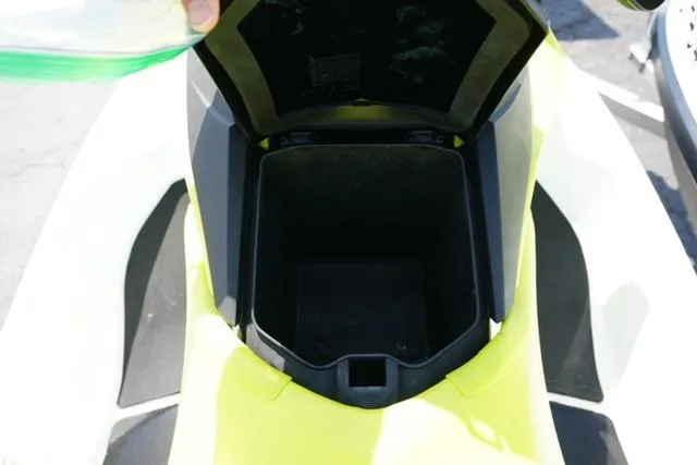 Slide: The Image of 2017 Sea-Doo GTI storage compartment open, showcasing interior space. - 9