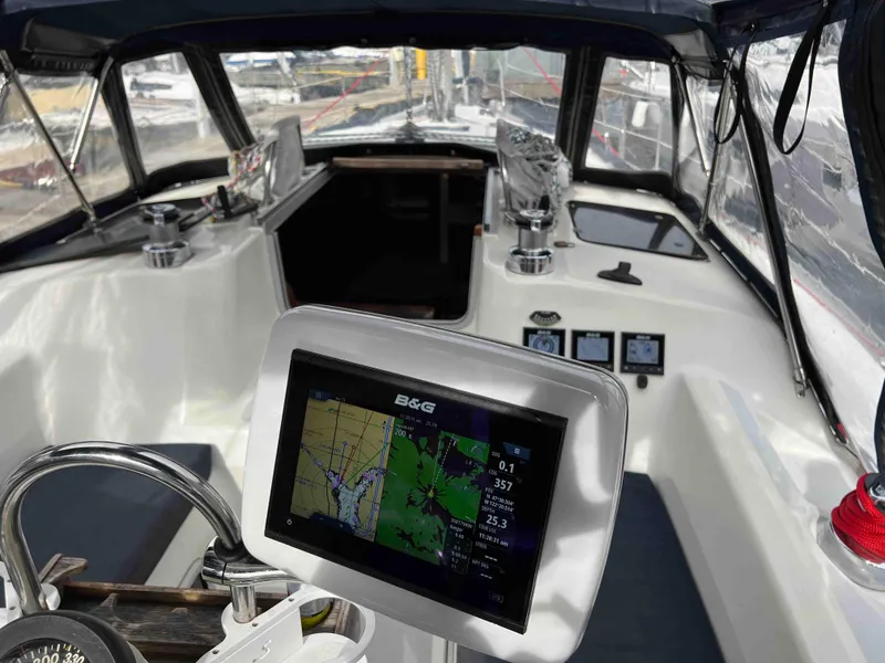Slide: The Image of Interior view of 1990 Hunter 37.5 sailboat cockpit with navigation equipment. - 22