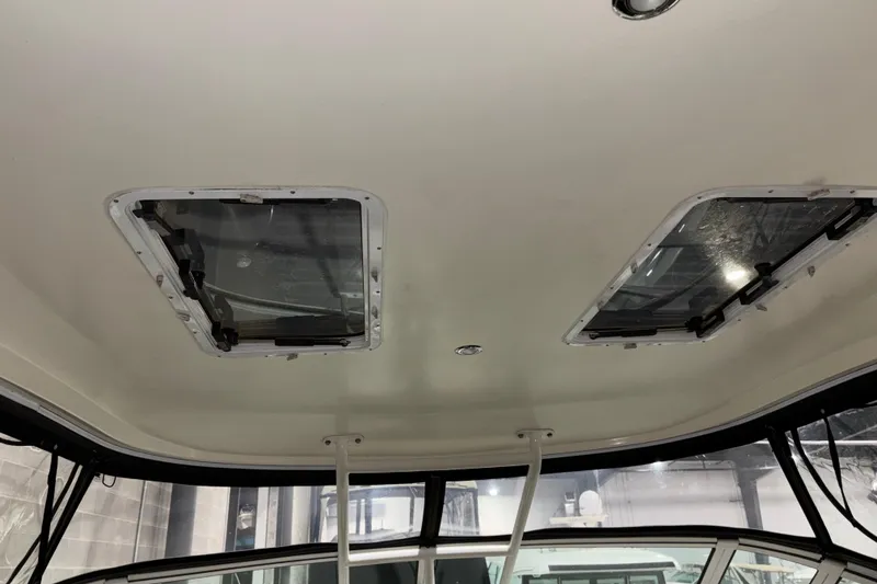 Slide: The Image of 2004 Cruisers Yachts 405 Express Motoryacht interior ceiling with dual skylights. - 20