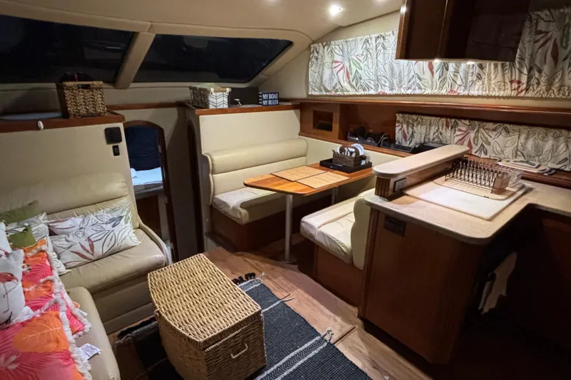 Slide: The Image of Luxurious interior of 2004 Cruisers Yachts 405 Express Motoryacht with cozy seating and elegant decor. - 22