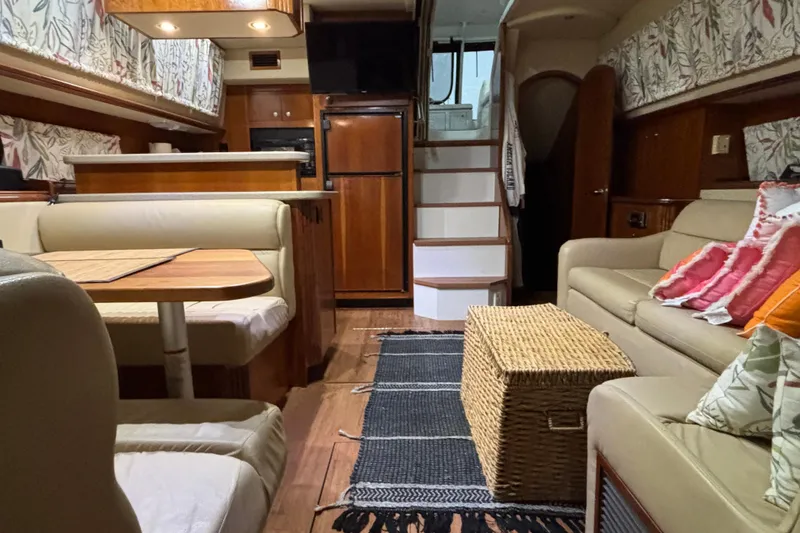 Slide: The Image of Luxurious interior of 2004 Cruisers Yachts 405 Express Motoryacht with cozy seating and elegant decor. - 33