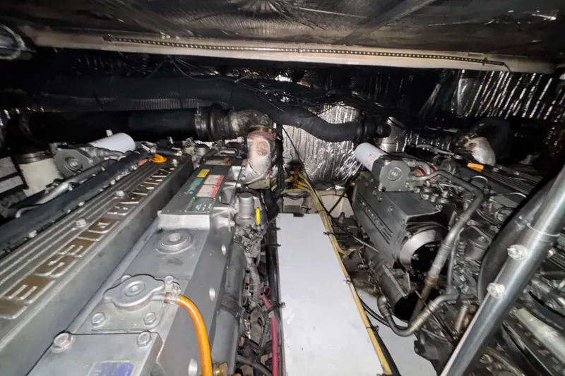 Slide: The Image of Engine room of 2004 Cruisers Yachts 405 Express Motoryacht, showcasing dual engines. - 46