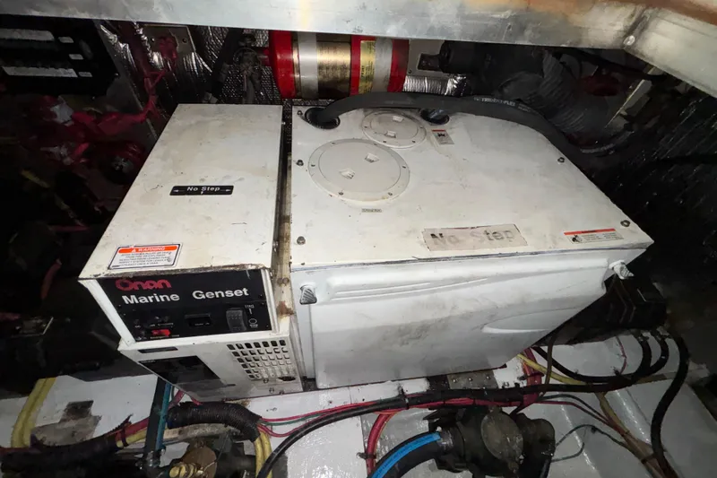 Slide: The Image of Engine room of 2004 Cruisers Yachts 405 Express Motoryacht with Onan Marine Genset. - 50
