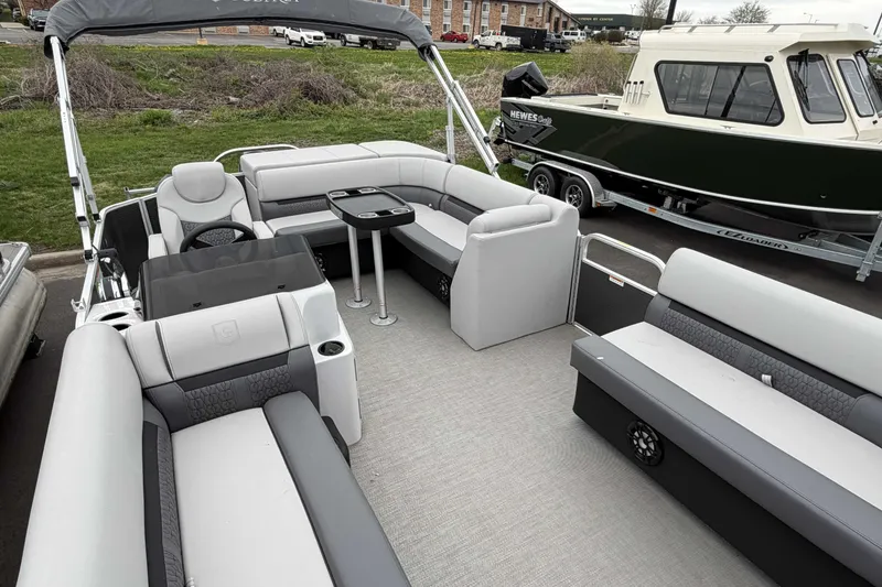Slide: The Image of 2022 Godfrey Sweetwater 2086 C pontoon boat with spacious seating and modern design. - 12