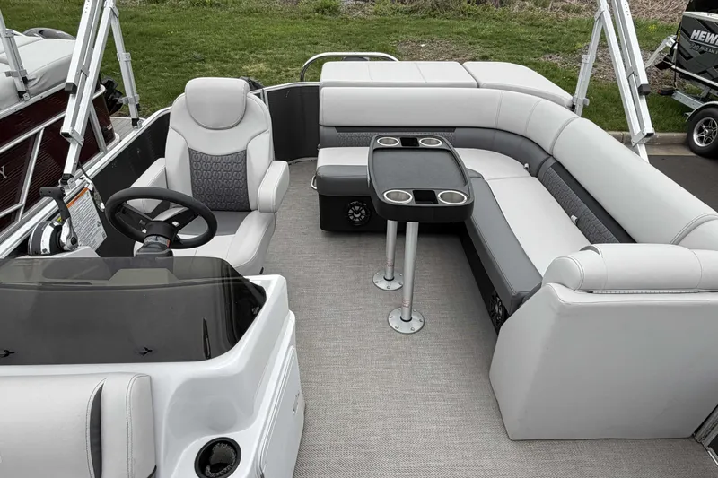 Slide: The Image of Interior of 2022 Godfrey Sweetwater 2086 C pontoon boat with seating and steering console. - 14