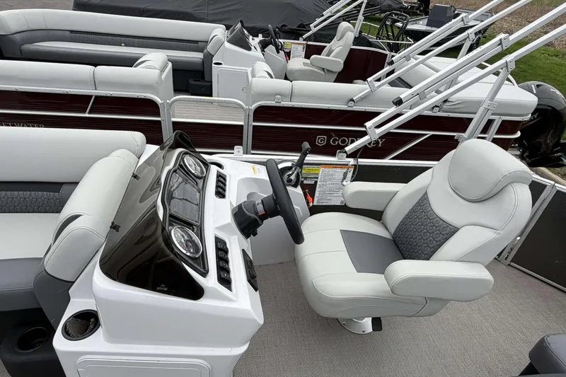 Slide: The Image of 2022 Godfrey Sweetwater 2086 C pontoon boat interior with helm and seating. - 15