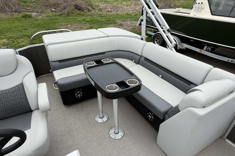 Slide: The Image of Interior of 2022 Godfrey Sweetwater 2086 C pontoon boat with seating and table. - 17