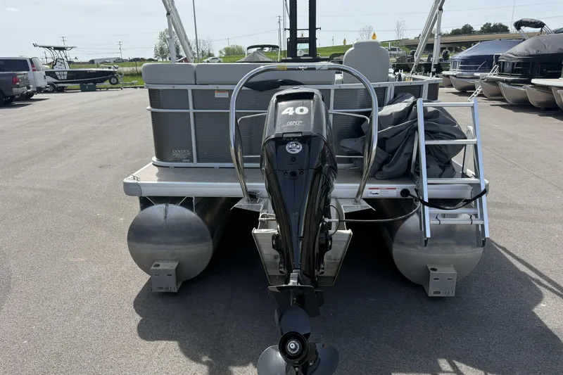 Slide: The Image of 2022 Godfrey Sweetwater 2086 C pontoon boat with 40 HP engine, parked outdoors. - 7