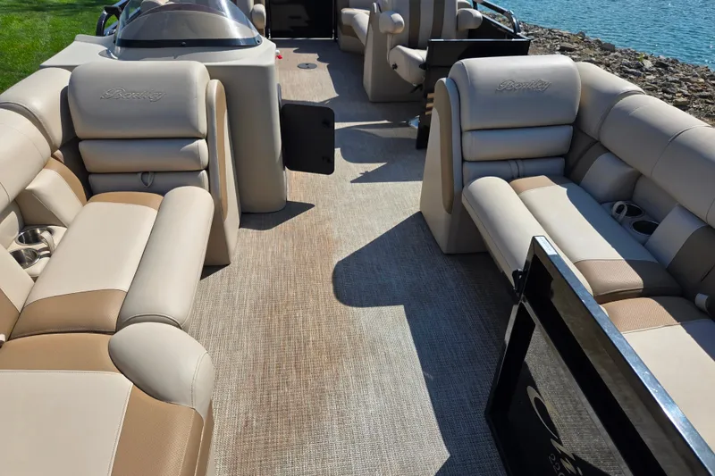 Slide: The Image of Luxurious interior of 2017 Bentley Pontoons 220 Elite Admiral, featuring plush seating and cup holders. - 10