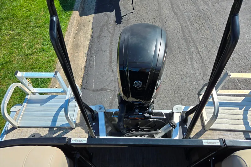 Slide: The Image of 2017 Bentley Pontoons 220 Elite Admiral with outboard motor, viewed from above. - 16