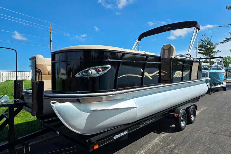 Slide: The Image of 2017 Bentley Pontoons 220 Elite Admiral on trailer under clear blue sky. - 6