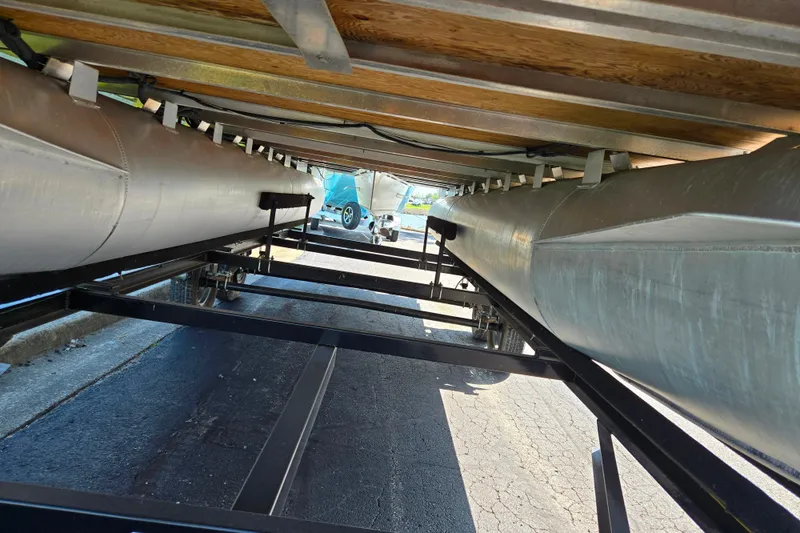 Slide: The Image of Underneath view of a 2017 Bentley Pontoons 220 Elite Admiral on a trailer. - 8