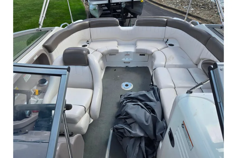 Slide: The Image of 2007 Yamaha Boats SX230 HO interior with spacious seating and covered floor area. - 20