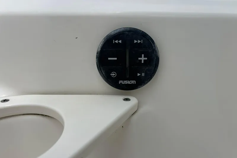 Slide: The Image of Fusion audio control panel on 2022 Boston Whaler 190 Montauk boat. - 25