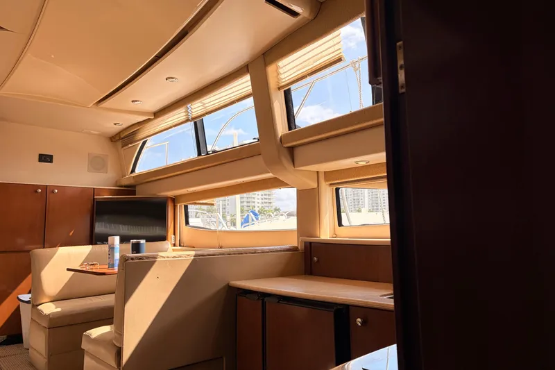 Slide: The Image of Interior of 2005 Meridian 368 Motoryacht with elegant seating and large windows. - 11