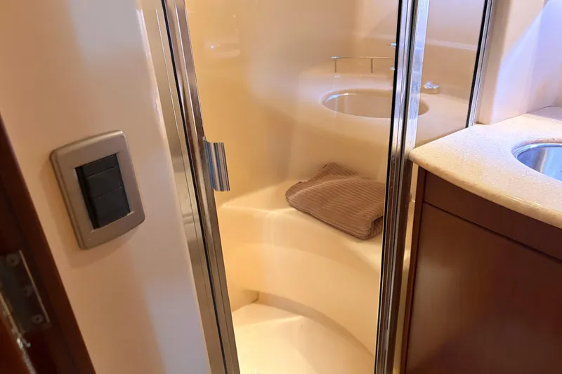 Slide: The Image of Luxurious bathroom interior of 2005 Meridian 368 Motoryacht with shower and sink. - 26