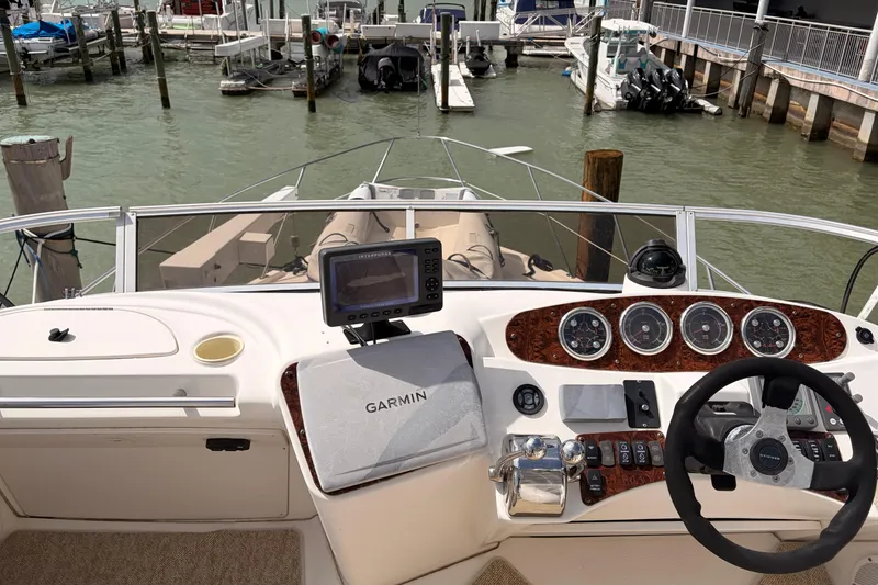 Slide: The Image of Helm of 2005 Meridian 368 Motoryacht with Garmin navigation, docked at marina. - 32