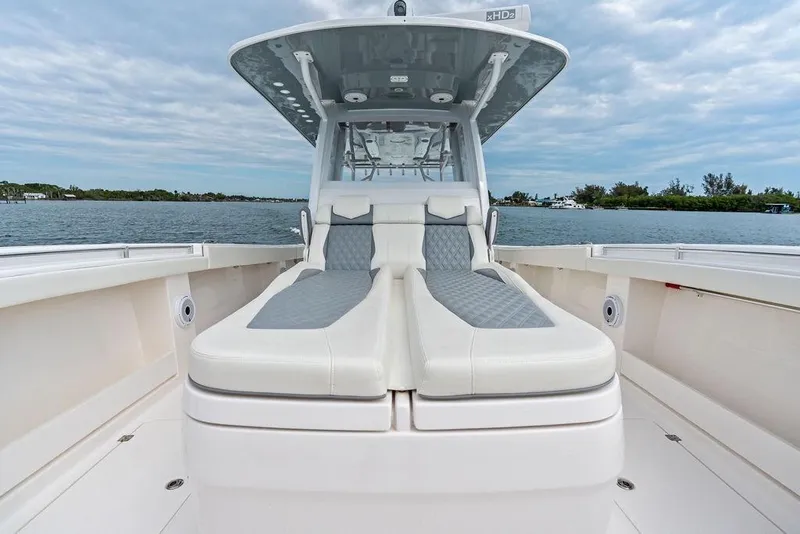 Slide: The Image of Luxurious seating on 2021 Invincible 46 Catamaran, featuring sleek design and waterfront view. - 25