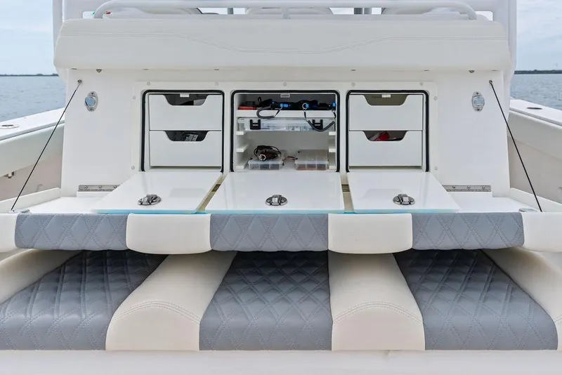 Slide: The Image of Luxurious seating and storage on 2021 Invincible 46 Catamaran, featuring sleek design and functionality. - 43