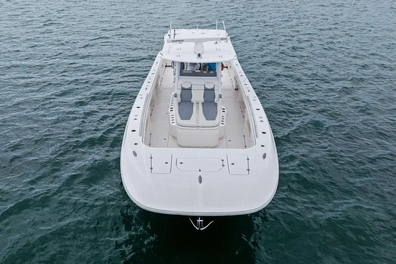 Slide: The Image of Invincible 46 Catamaran 2021 on open water, aerial view showcasing sleek design. - 8