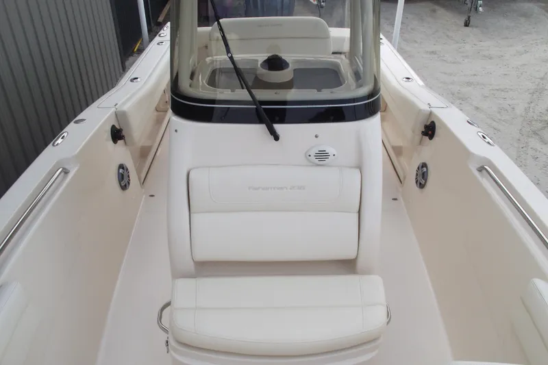Slide: The Image of 2023 Grady-White Fisherman 236 boat interior with seating and console. - 12