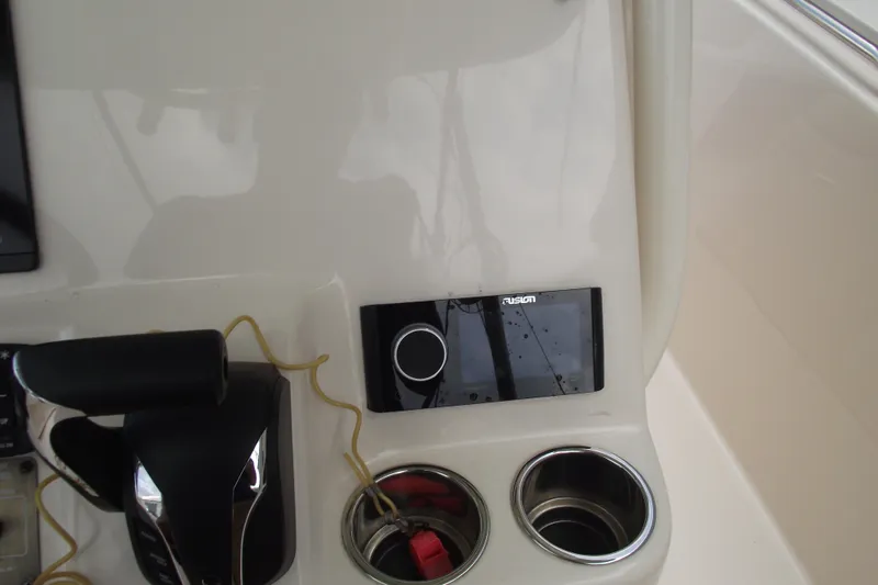 Slide: The Image of Control panel of 2023 Grady-White Fisherman 236 boat with Fusion audio system. - 18