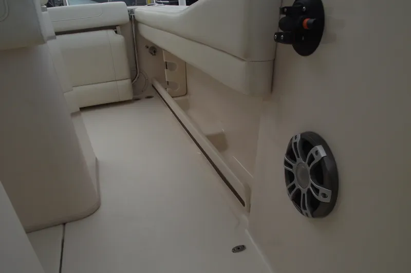 Slide: The Image of Interior view of 2023 Grady-White Fisherman 236 boat, featuring seating and speaker. - 23